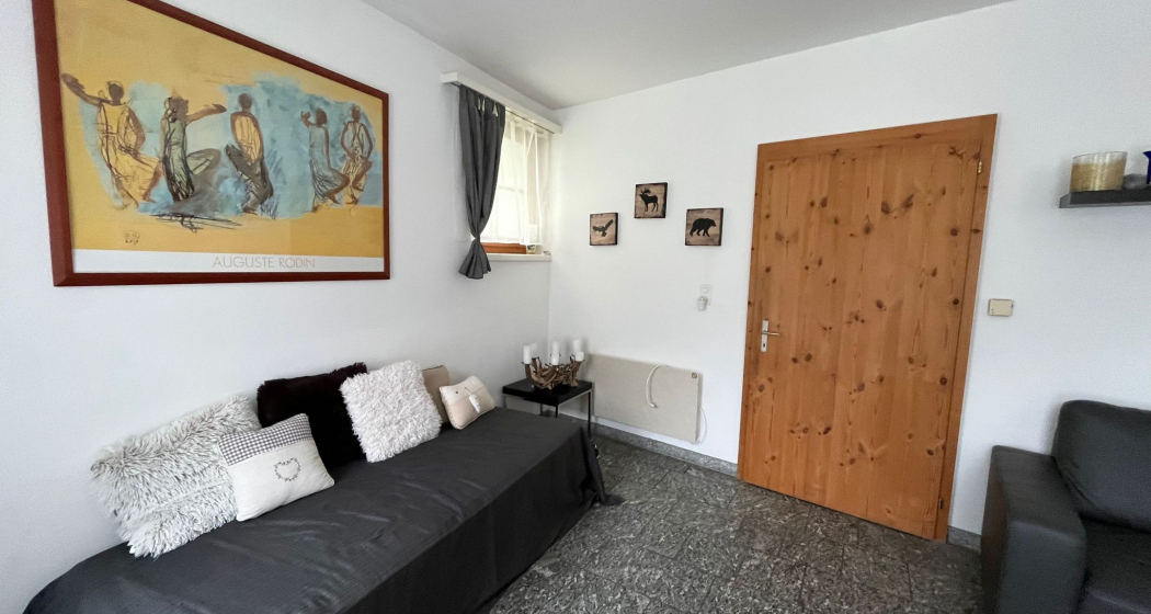Wohnzimmer Ferienwohnung Luzi Bergün