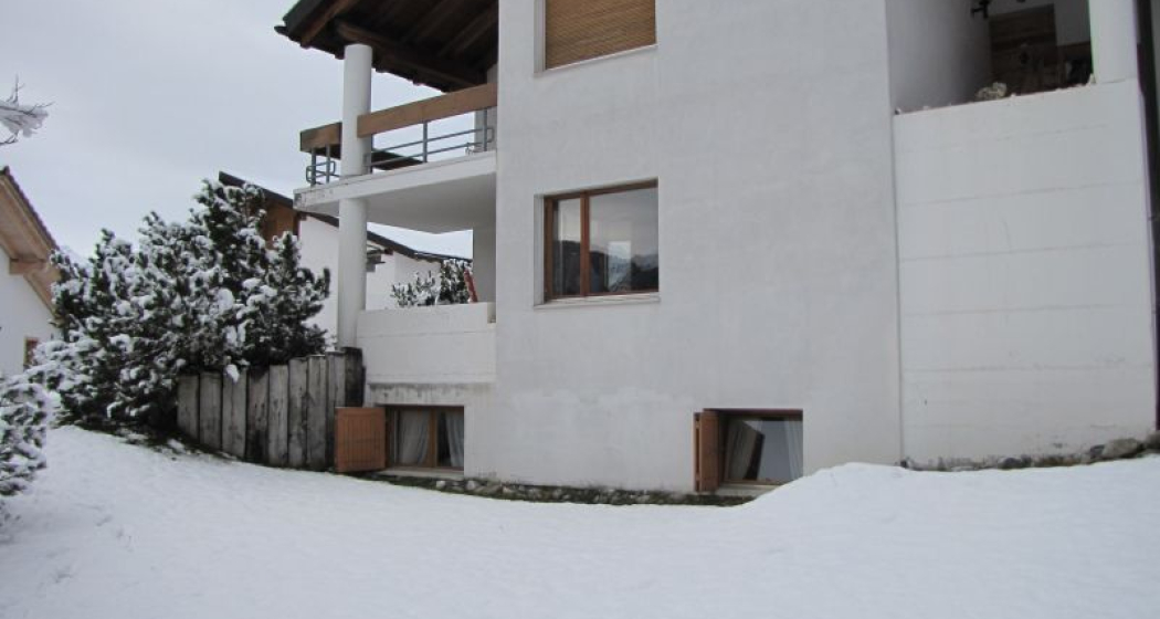 Ferienwohnung Sur Mulins Schneider - Ansicht Winter