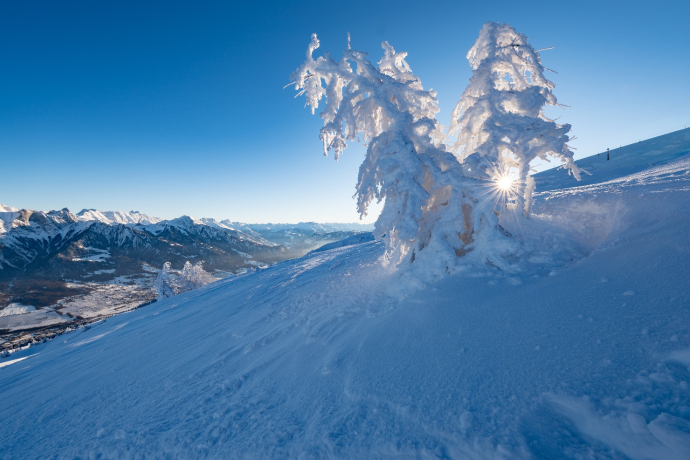 Snowy landscape and view from the day ski touring slope