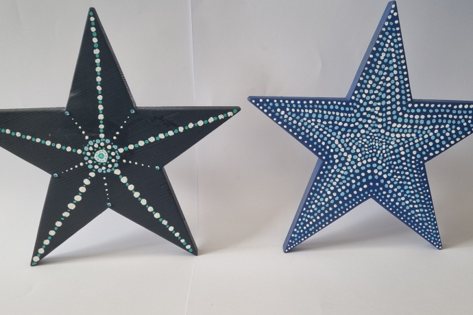 Zwei Sterne auf einem weissen Hintergrund.