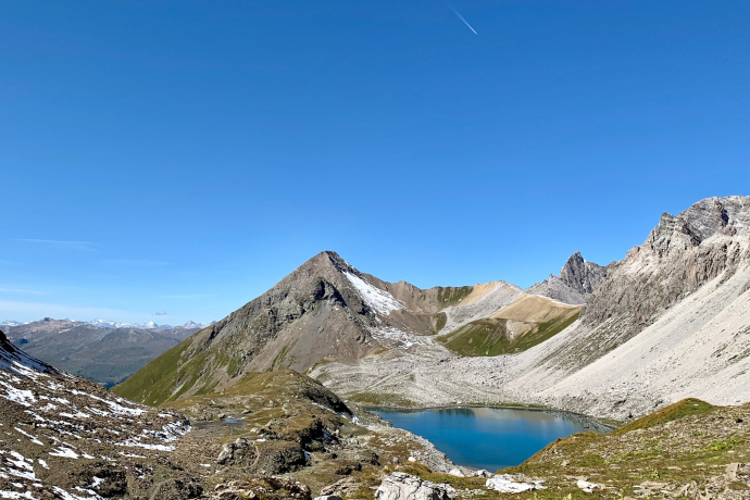 Stage 10: Ascent to Fuorcla da Tschitta. View back to Pizza Grossa, Cotschen, and Tinzenhorn