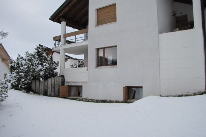 Ferienwohnung Sur Mulins Schneider - Ansicht Winter