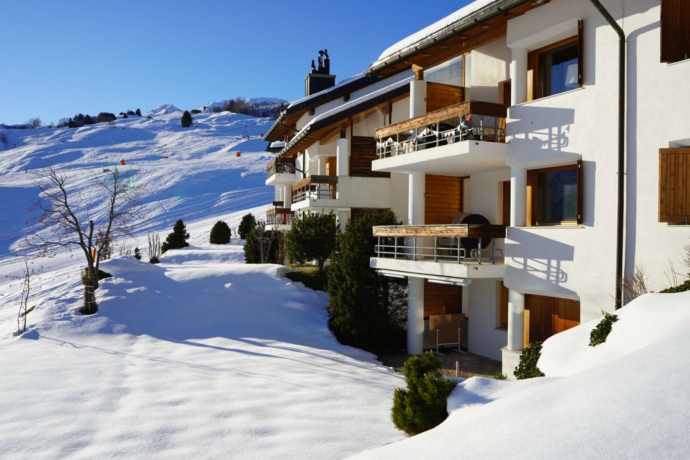 Ferienwohnung Sur Mulins 12.4 - Ansicht Winter