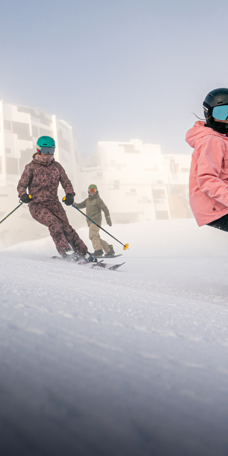 Skiers and snowboarders in LAAX
