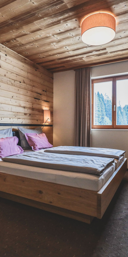 Schlafzimmer in der Priva Alpine Lodge Lenzerheide