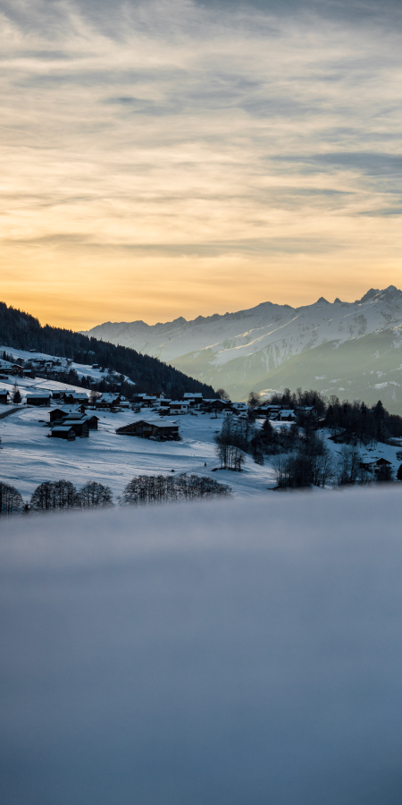 Abendstimmung auf der Winterweitwanderung Via Mundaun 