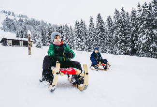 Schlitteln in Lenzerheide (© Travelisto) Schlitteln in Lenzerheide (© Travelisto)