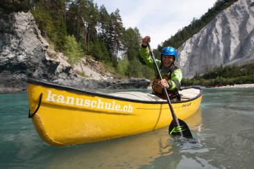 A canoeist paddles through the Rhine gorge