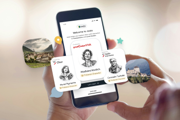 Smartphone mit Joaia-App und KI-Ortsführer*innen für Graubünden